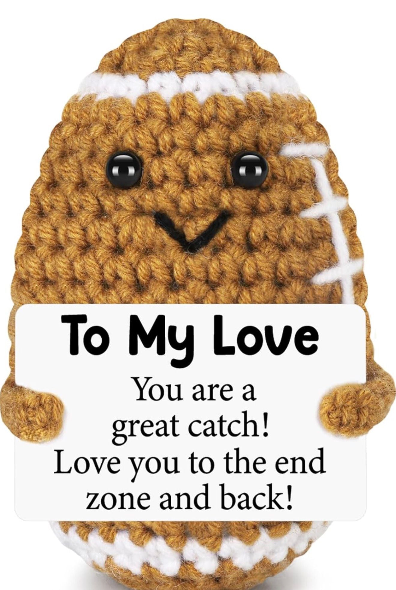 Crocheted football-themed plush toy with a message card on a white background
