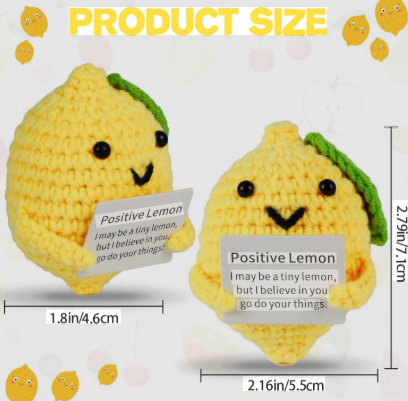 Two yellow lemon-shaped plush toys with a smiley face and text, displayed with measurements.