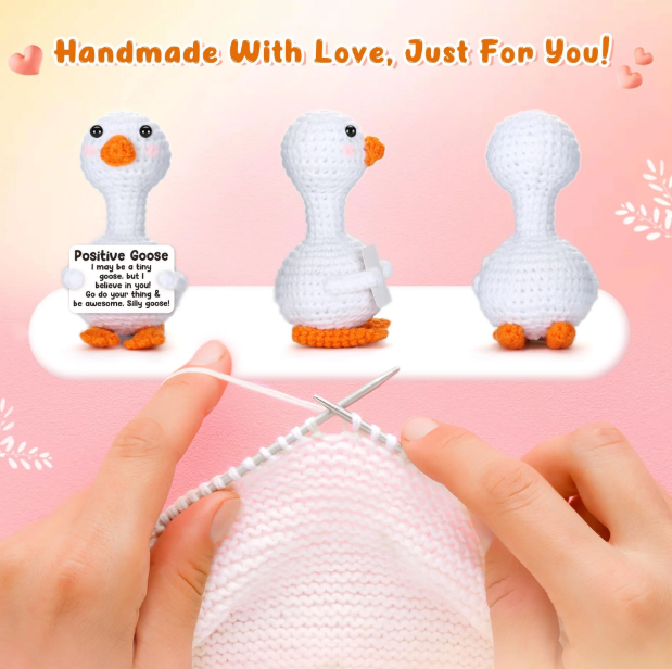 Three white crochet ducks with orange beaks on a pink background, with text 'Handmade With Love, Just For You!' and a person knitting.