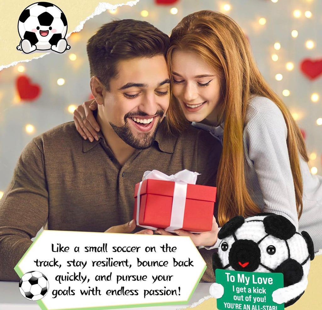 Couple with a gift and soccer-themed plush toy, surrounded by heart decorations.