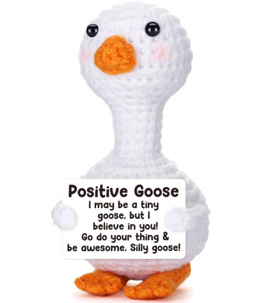 Crocheted goose toy with a motivational message on a white background